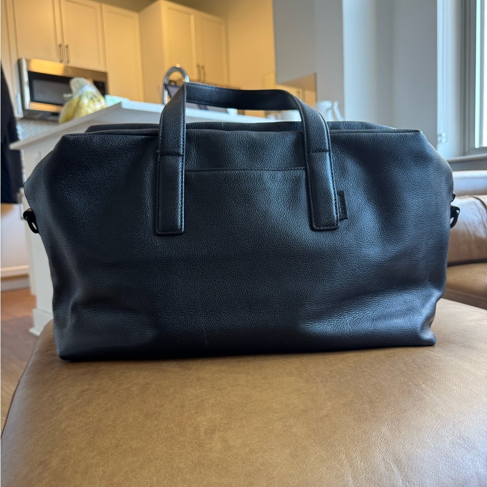 Away Everywhere Bag in Black Leather - slides onto rolling suitcase
